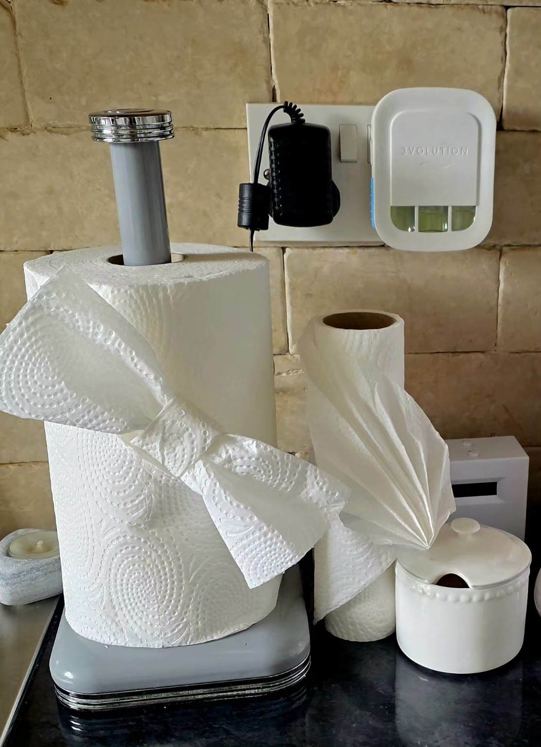 Kitchen rolls finished with decorative bow and fan folds